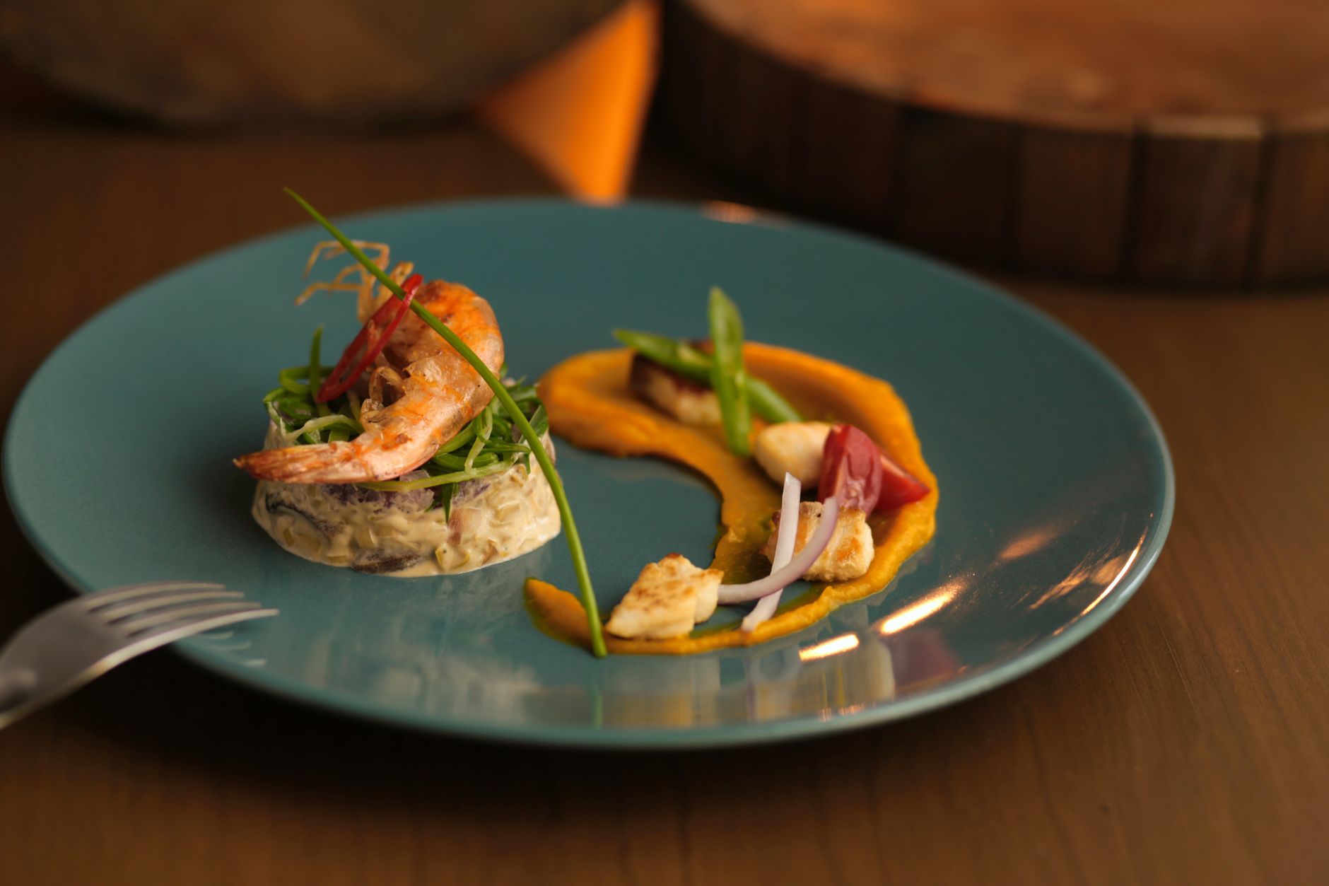 Wild coastal herbs and ocean harvest prepared by chef